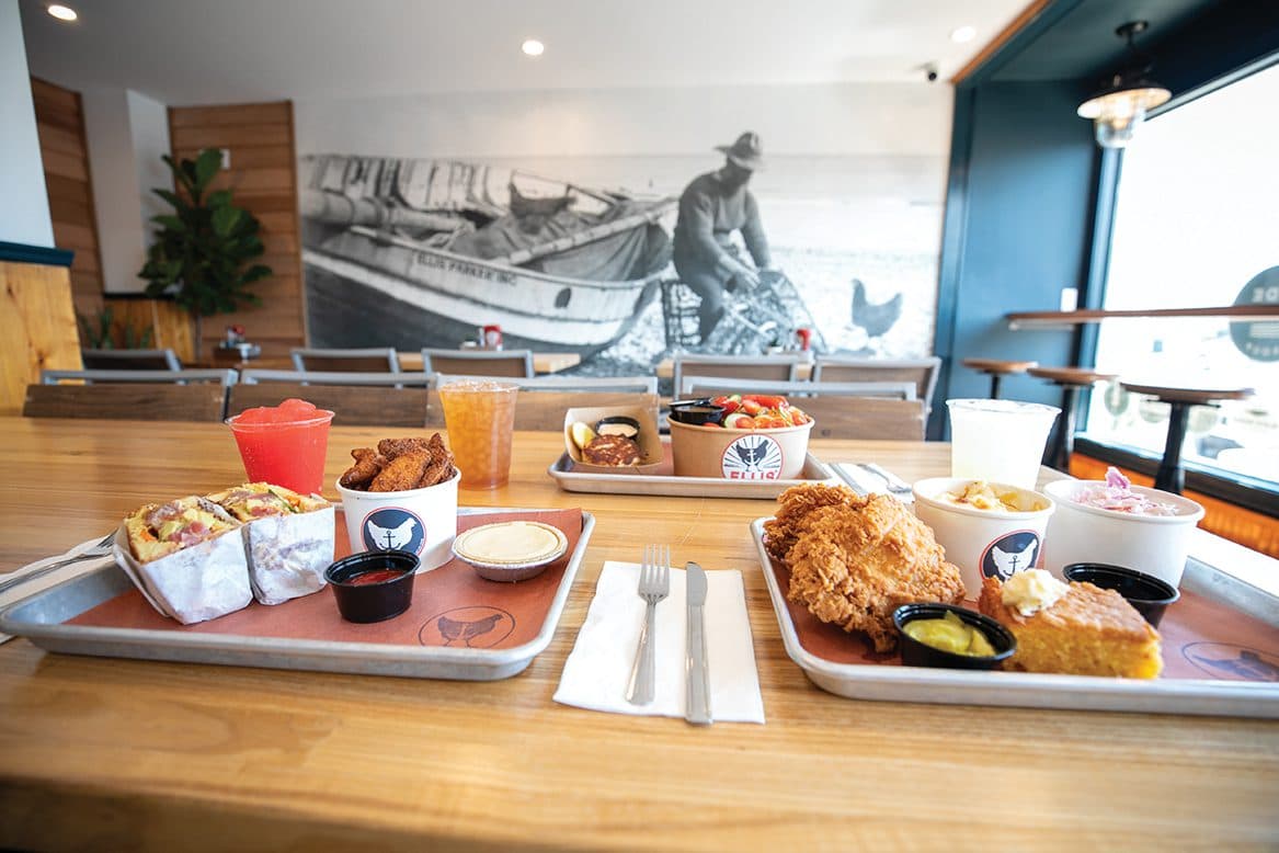 Inside Ellis' — Ellis Parker mural and a spread of food